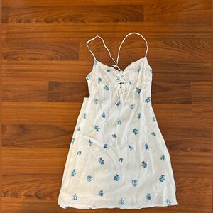 White dress with blue flowers